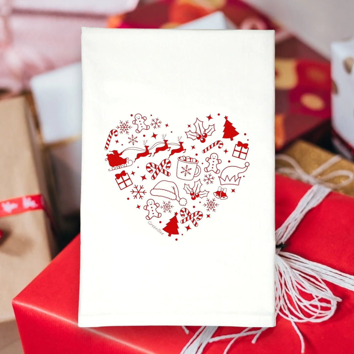 White towel with red Christmas-themed heart design Green Bee Tea Towels